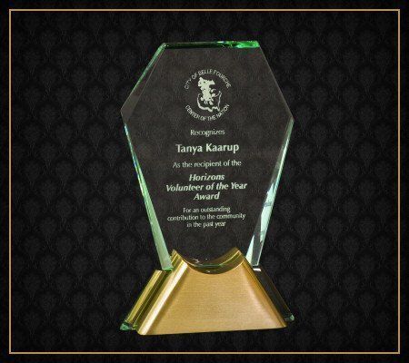A glass plaque with the name tanya kramer on it