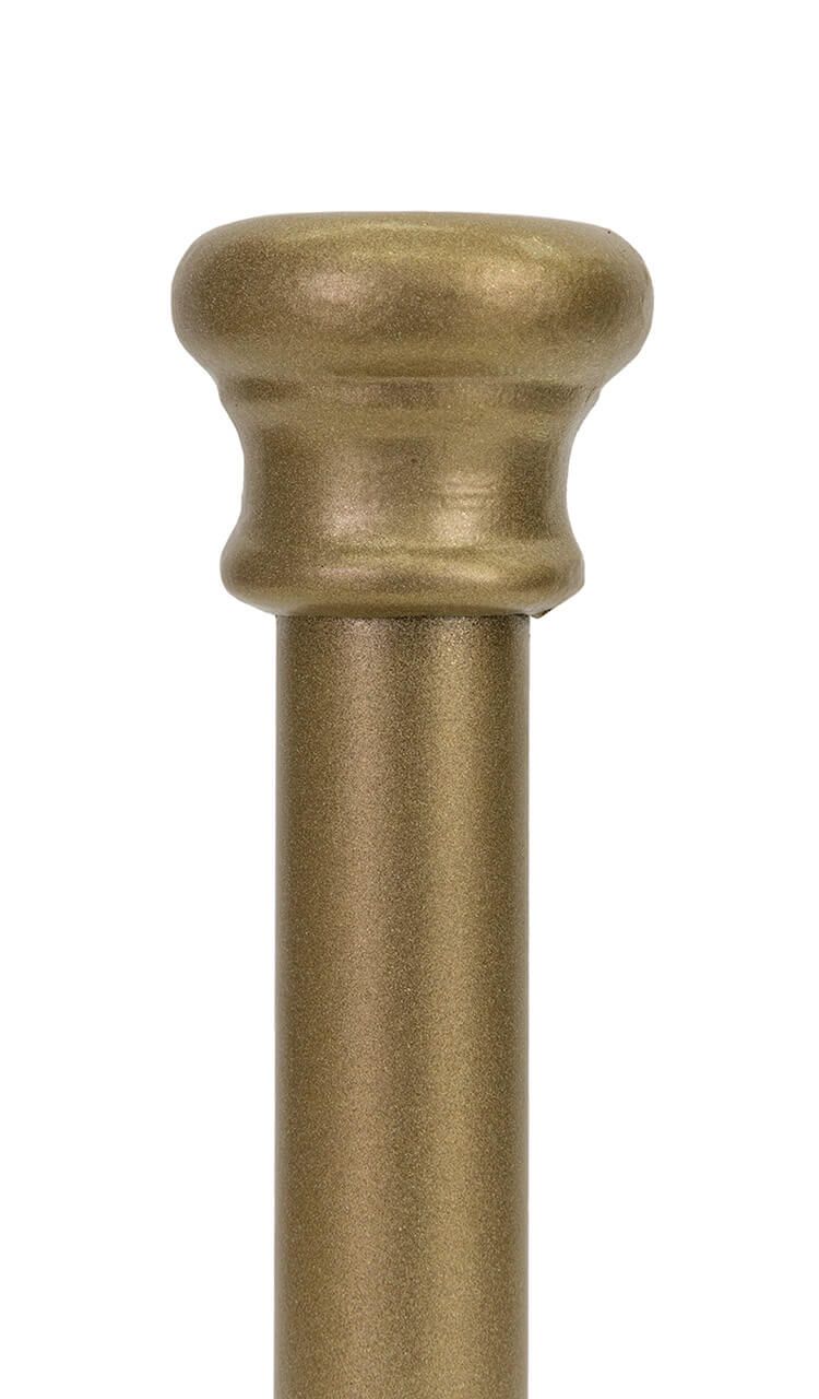 A close up of a brass pole on a white background.