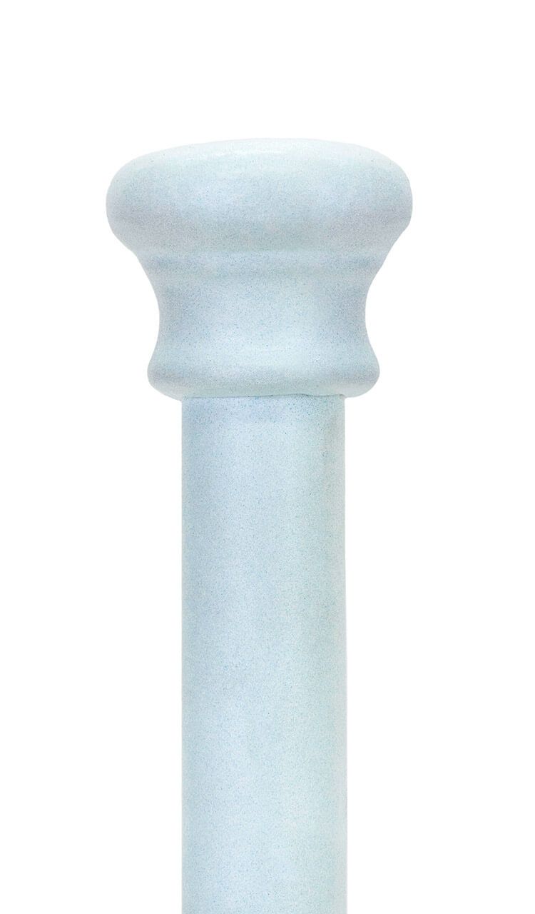 A close up of a white pole on a white background.