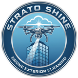 Blue circular logo with a drone above a glass building, reading “STRATO SHINE DRONE EXTERIOR CLEANING”