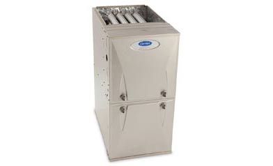 Beige metal HVAC air handler unit with vents and a circular logo on top