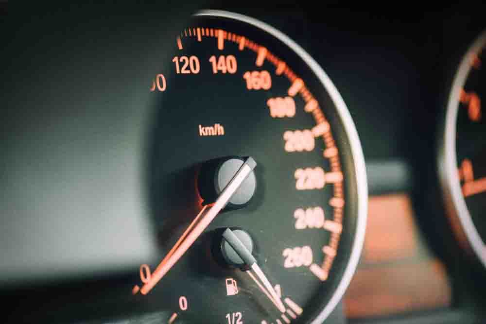 a close up of an automotive speedometer
