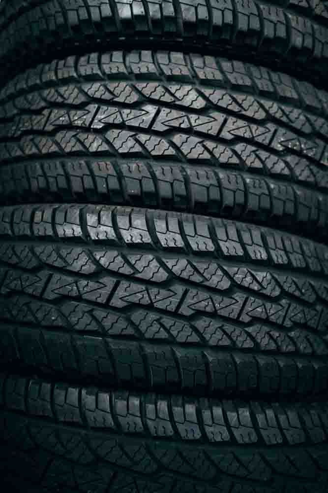 close up of a stack of automotive tires
