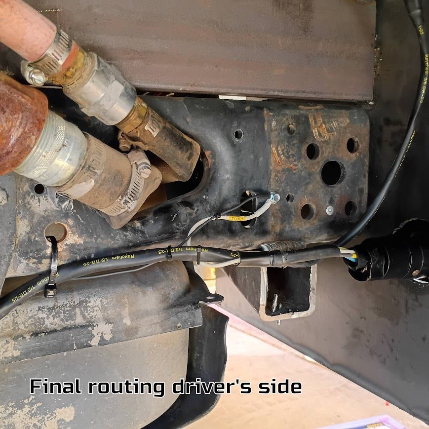 Underbody wiring routed along driver’s side near hoses and metal frame with “Final routing driver’s side” text