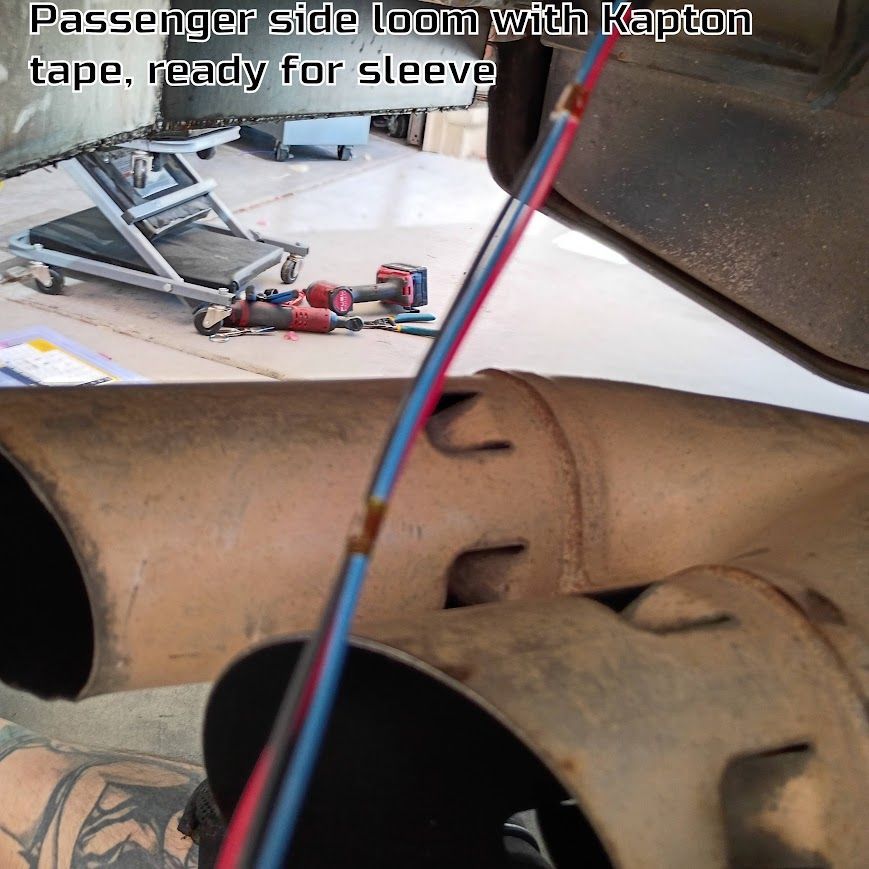 Passenger-side loom with red and blue wires wrapped in Kapton tape, ready for sleeve