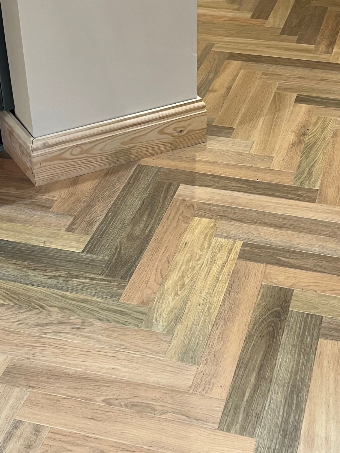 a wooden floor with a herringbone pattern