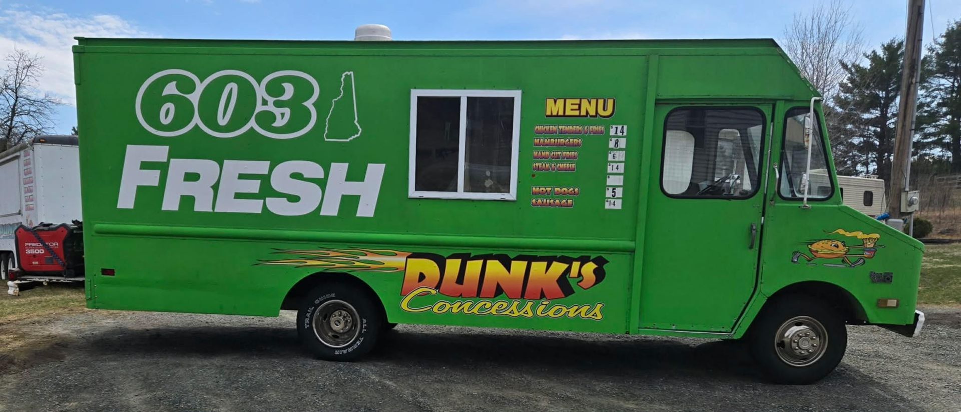 Green food truck with “603 Fresh” and “Punk’s” branding parked outdoors.