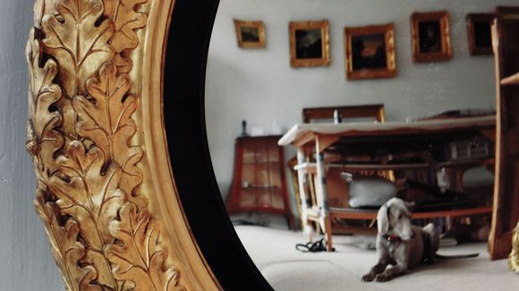 Oak leaf convex mirror.