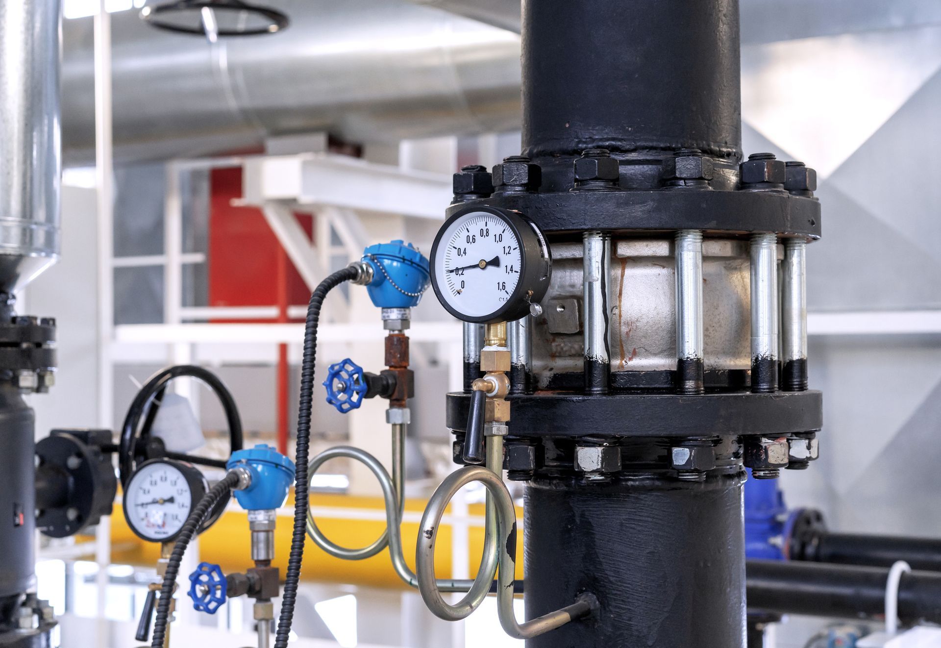 Flanged check valve with pressure gauge in a gas boiler room