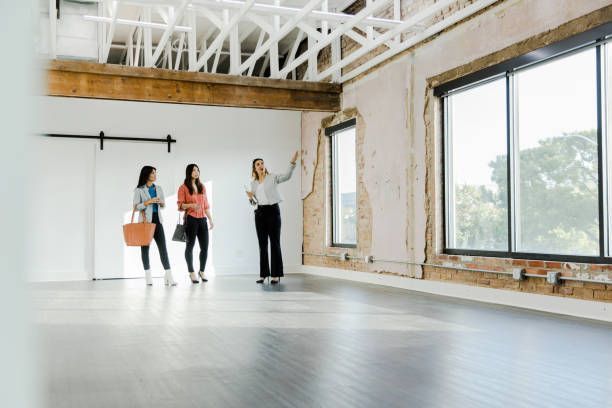 Real Estate Agent Explaining Office Features — Casper, WY — Commercial Services Inc.