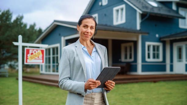 Real Estate Agent Holding Tablet — Casper, WY — Commercial Services Inc.