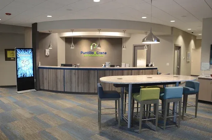 Front desk and welcome area at Puntillo & Crane Orthodontics in Crown Point