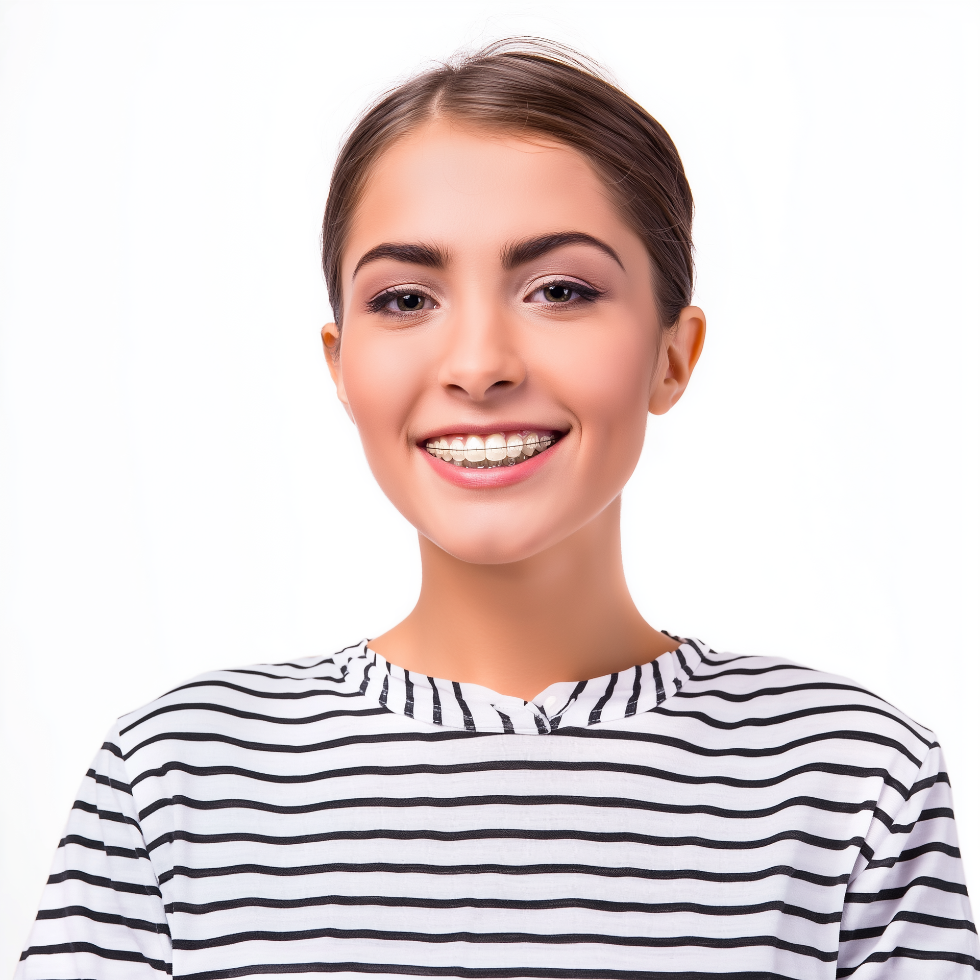 Woman with braces smiling, wearing a striped shirt.