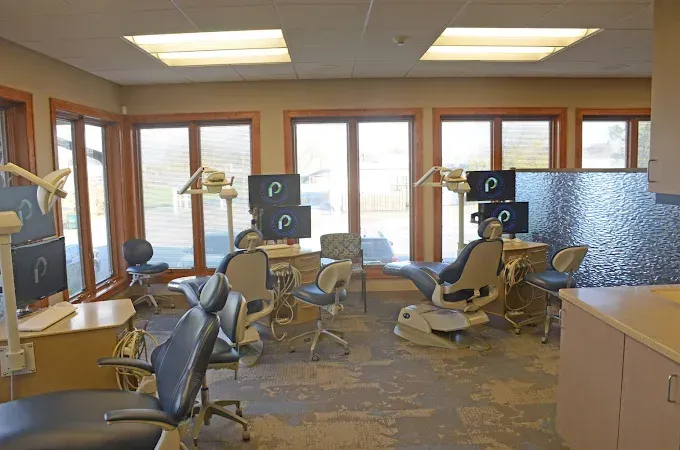 Orthodontic treatment chairs beside the windows at the Valparaiso office