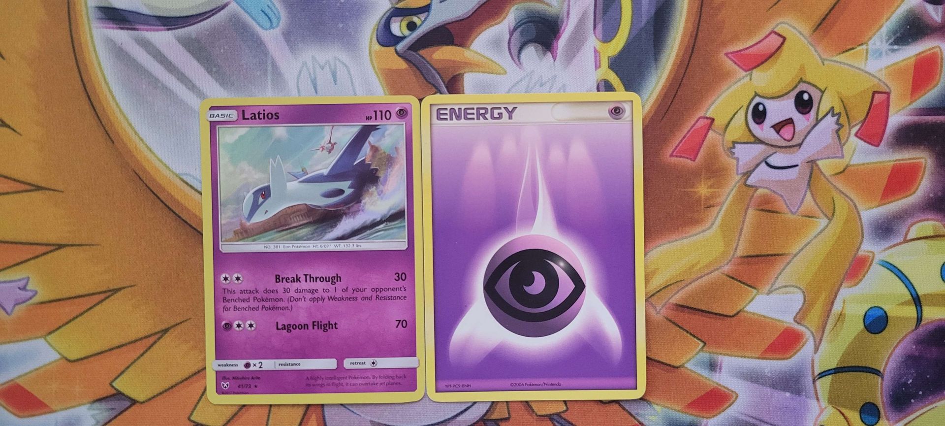 A Psychic-type Pokémon beside a Psychic Energy card.