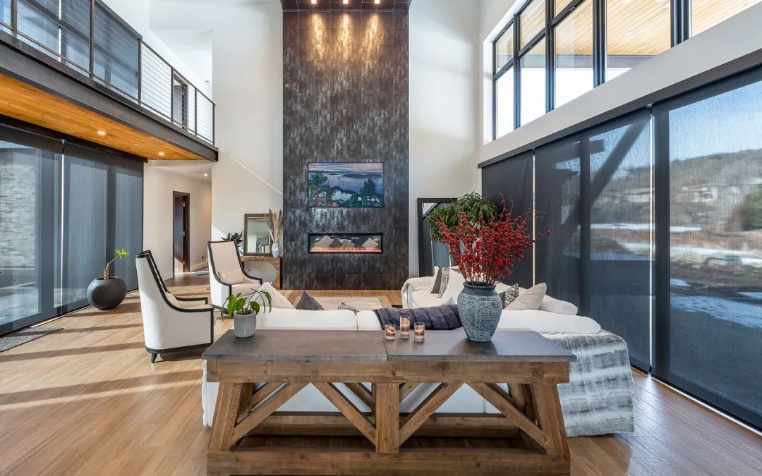 Draper® window screens in an open concept living room.