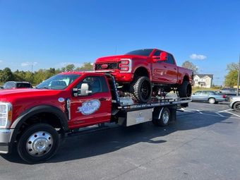 E & E Towing Service towing a truck in Nashville, TN - reliable car towing services available 24/7