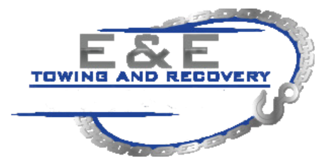 Logo of E & E Towing Service: A tow truck in motion, ready to assist.