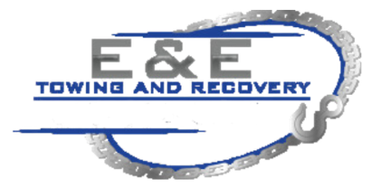 Logo of E & E Towing Service: A tow truck in motion, ready to assist.
