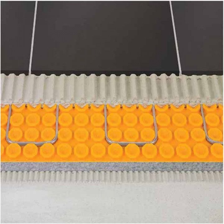 Cross-section of underfloor heating system with orange insulation, metal pipes, and tile flooring.