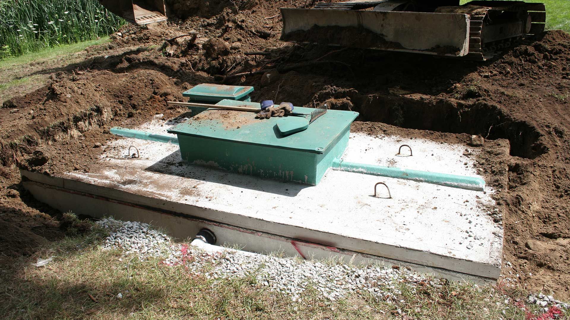 Septic tank installation in a dug-out area.