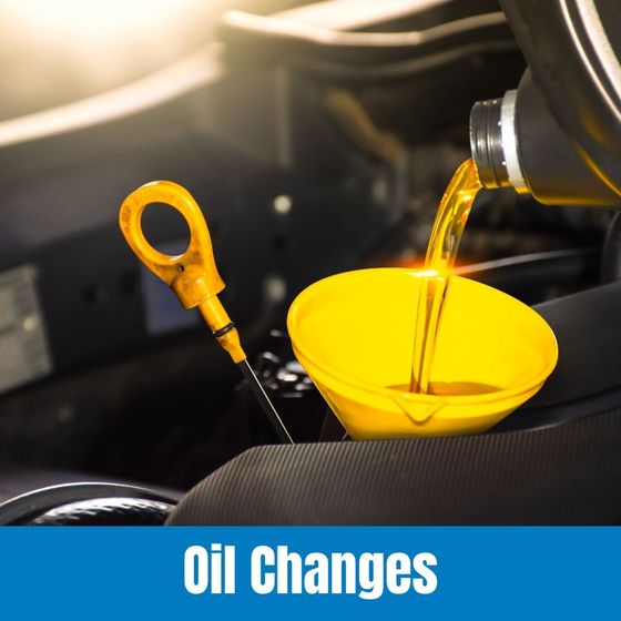 Motor oil pouring into a yellow funnel in a car engine, labeled “Oil Changes”