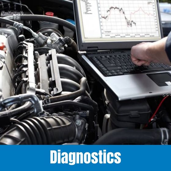 Car engine diagnostics with laptop displaying data and a technician’s hand near the engine bay