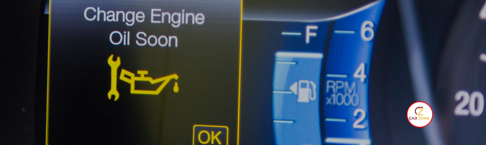 Car dashboard warning: “Change Engine Oil Soon” with yellow oil icon and fuel gauge display