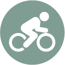 A person is riding a bike in a circle.