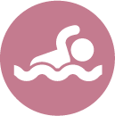 A person is swimming in the water in a pink circle.