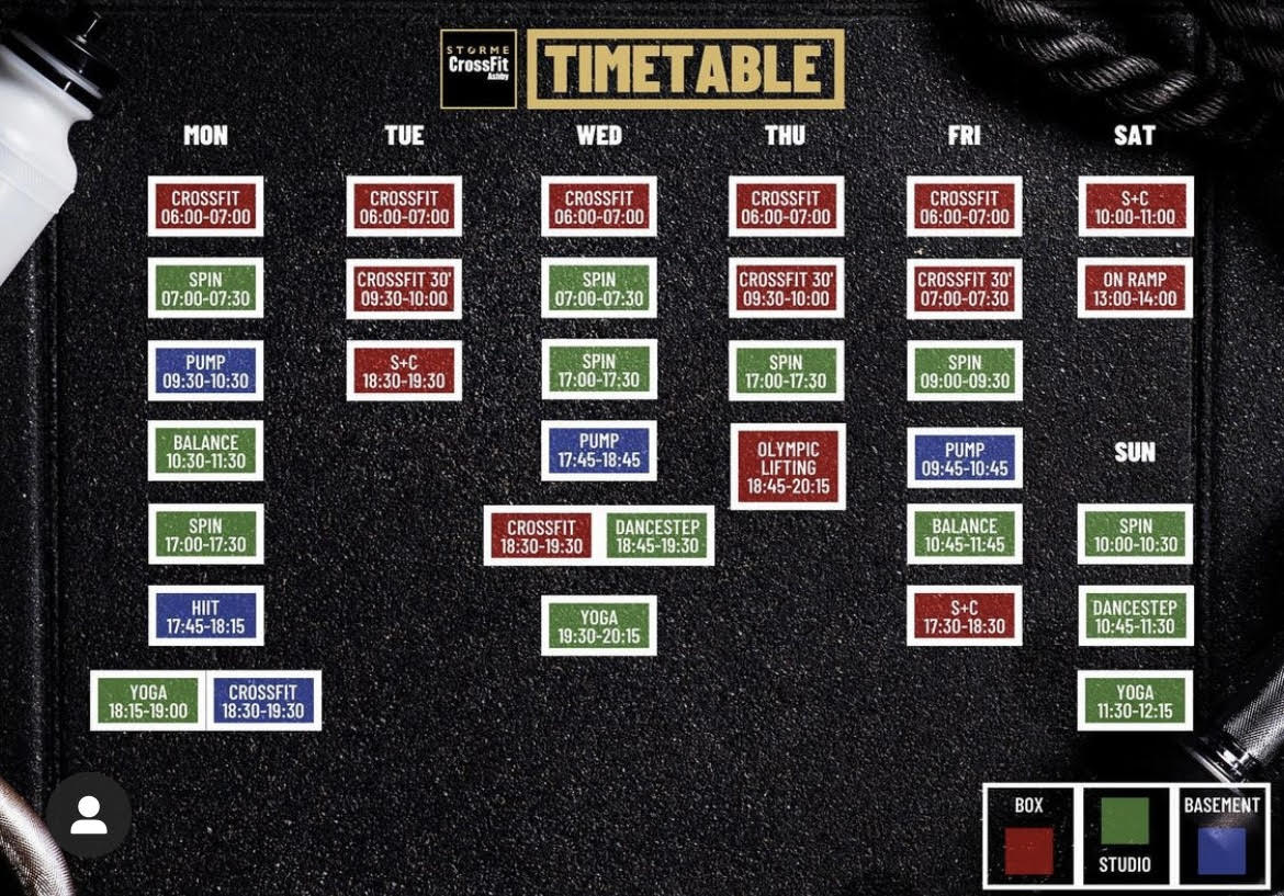 A computer screen shows a timetable for the week