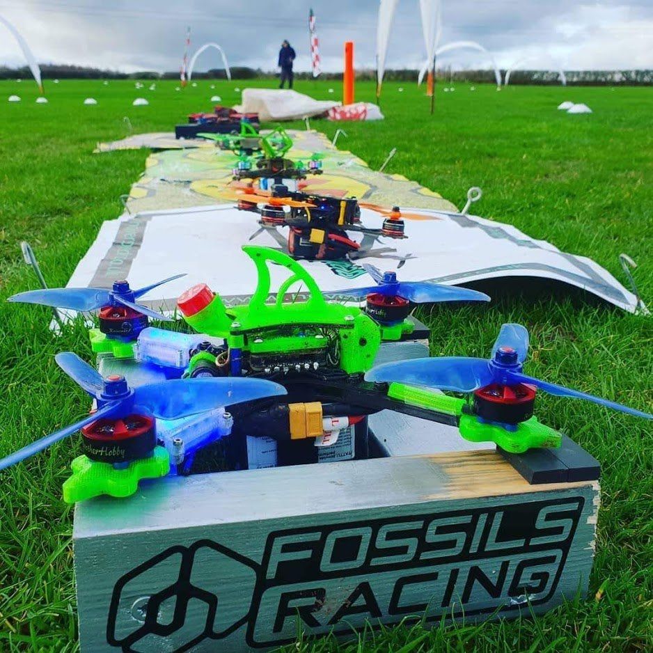 A box that says fossils racing on it