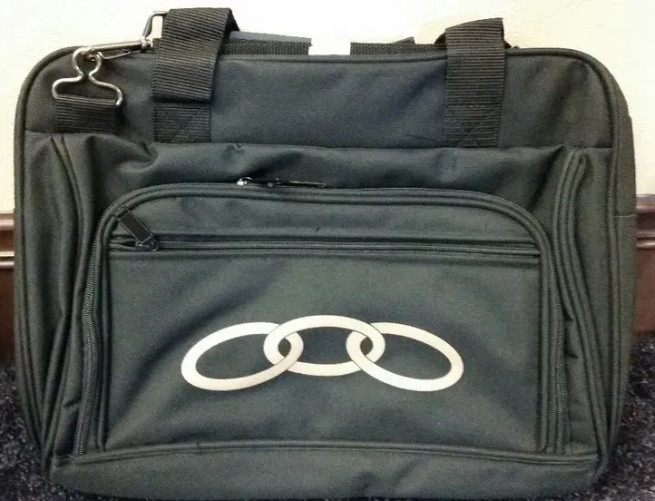 A black bag with an audi logo on it