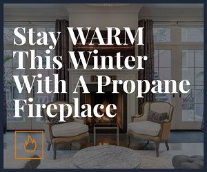 A living room with a fireplace and the words stay warm this winter with a propane fireplace