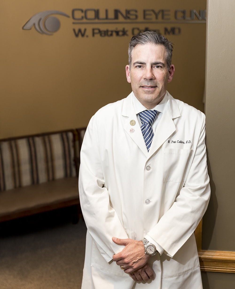 Optometrist Examines Eye of a Patient — Springfield, MO — Collins Eye Care