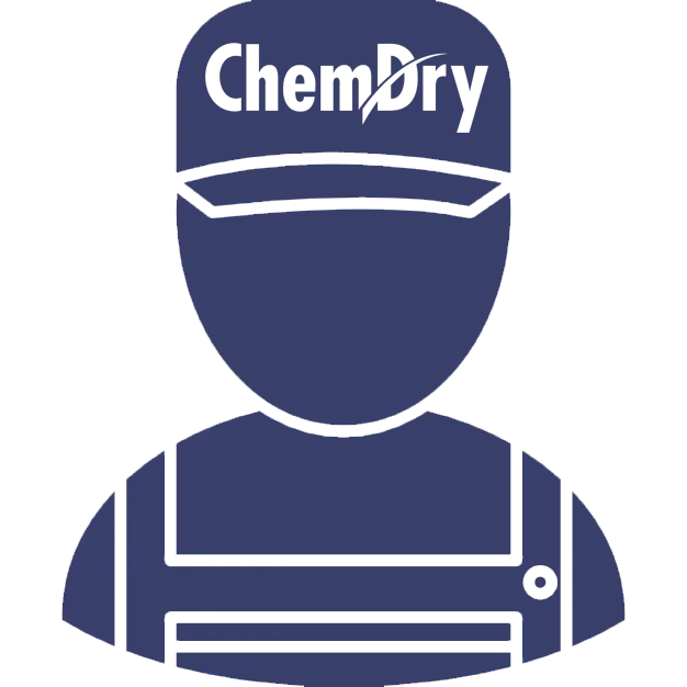 A dark blue icon of a worker wearing a cap with the 