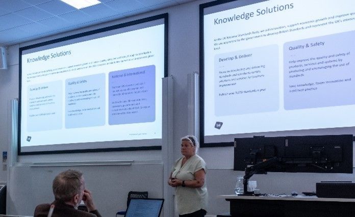 Photo of Lena Cordie-Bancroft giving the keynote presentation