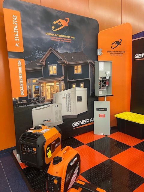 Generator display booth with orange-and-black equipment and a house backdrop.