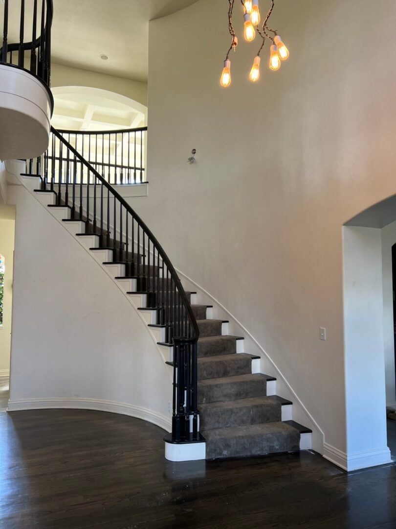 There is a staircase in the middle of the room.
