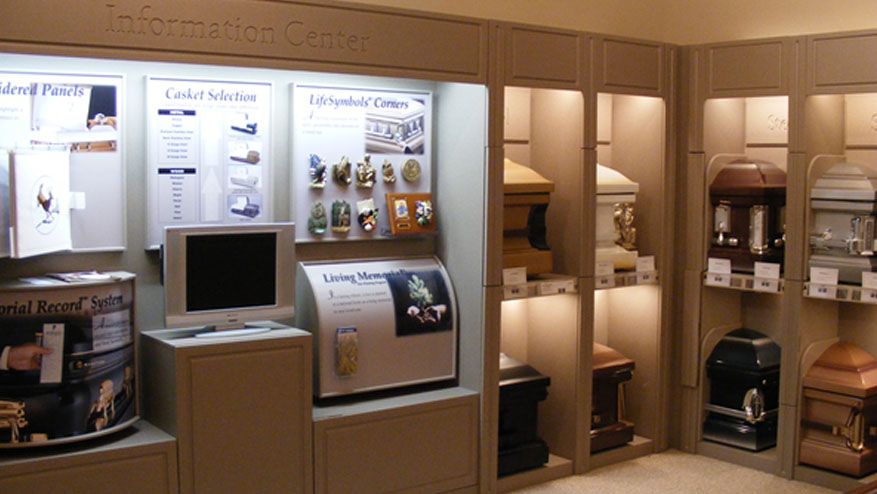 a room with a computer and a sign that says information center