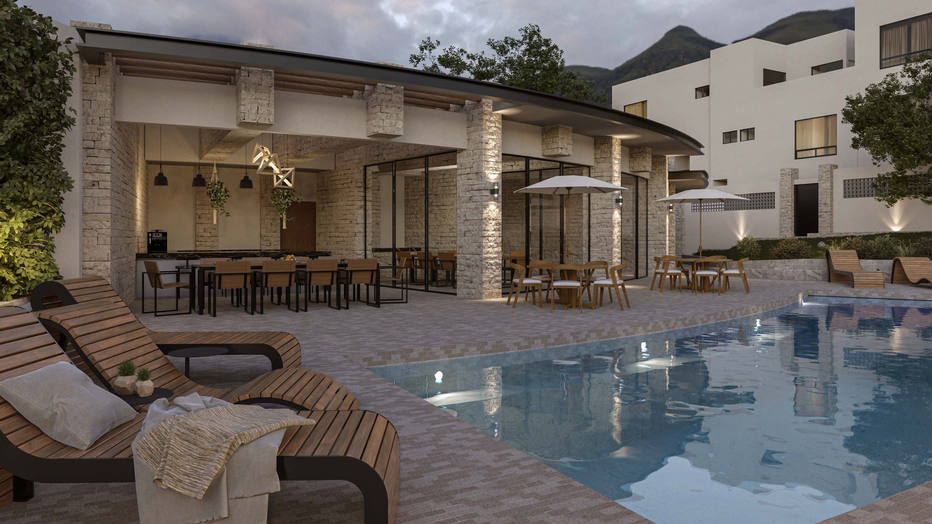 Piscina de lujo en un complejo turístico con tumbonas, cabañas y un moderno patio para comer al aire libre al atardecer.