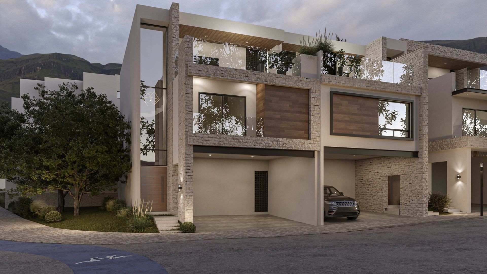 Edificio de apartamentos moderno de varias plantas con balcones, fachada de piedra y un coche aparcado al anochecer.