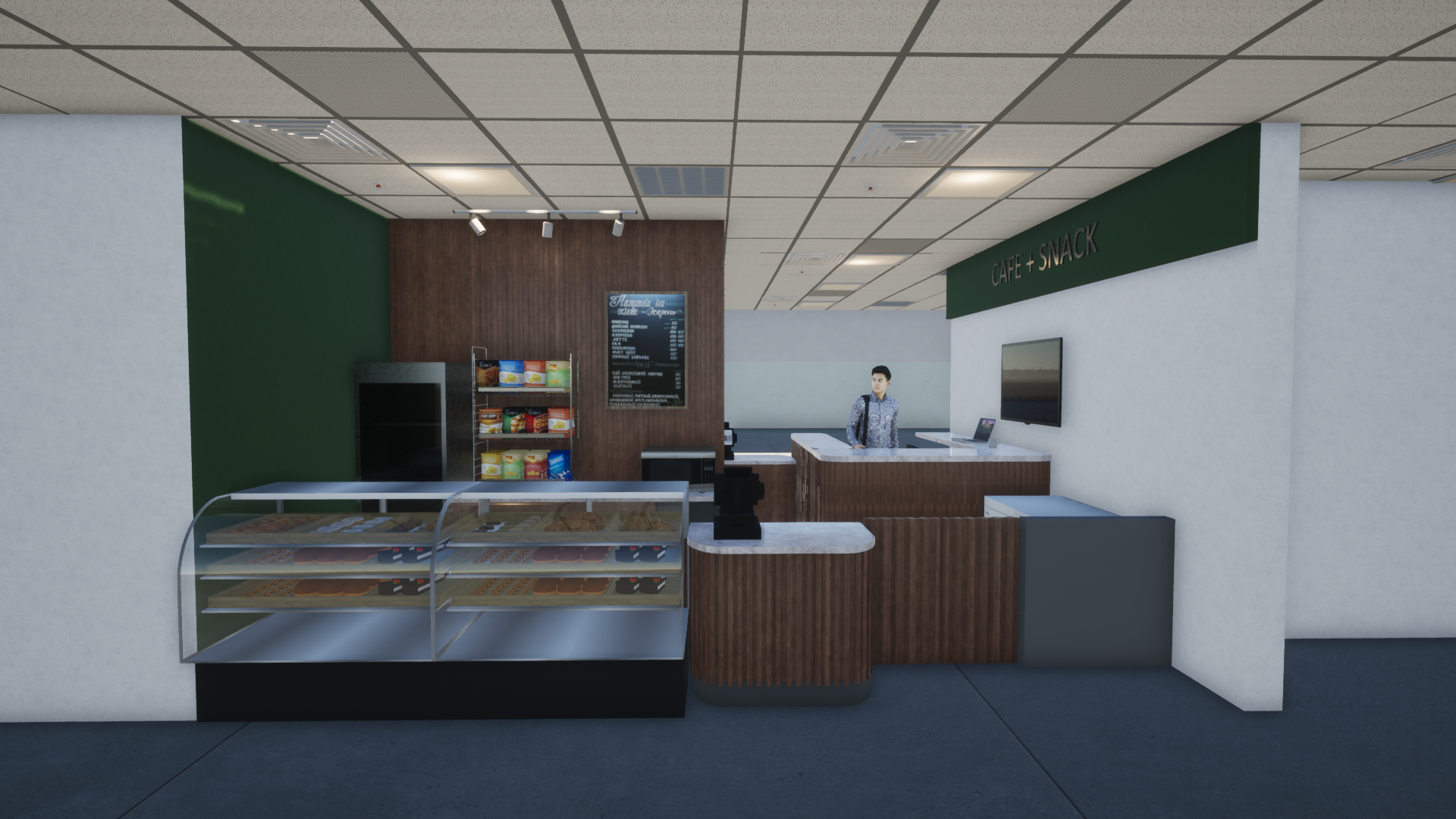 Interior moderno de una cafetería con vitrina, mostrador y una persona detrás de la caja.