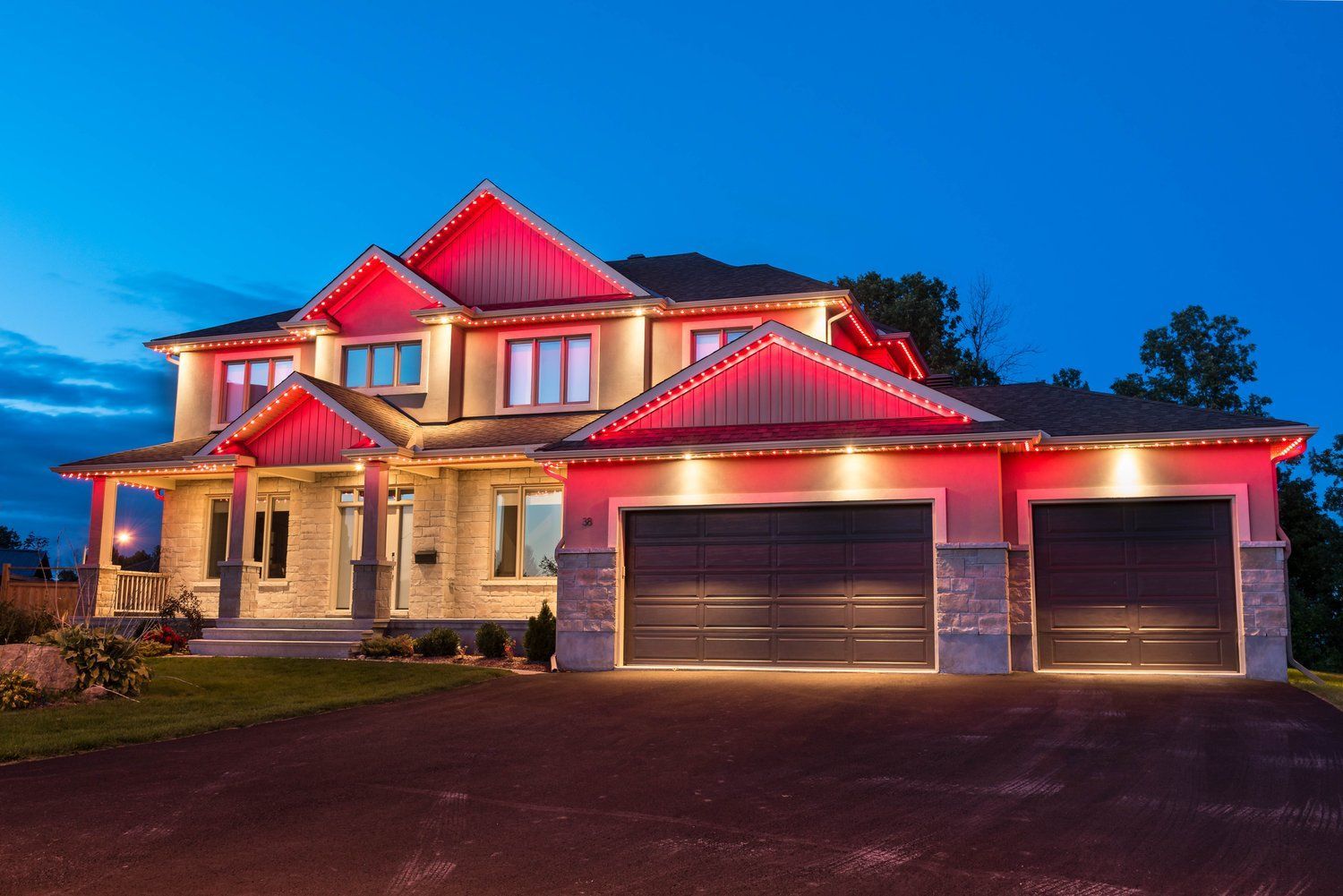 A large house with red lights on the roof