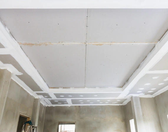 Drywall ceiling construction in progress.
