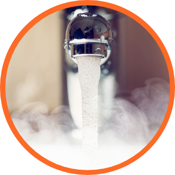 Faucet with hot water steaming.