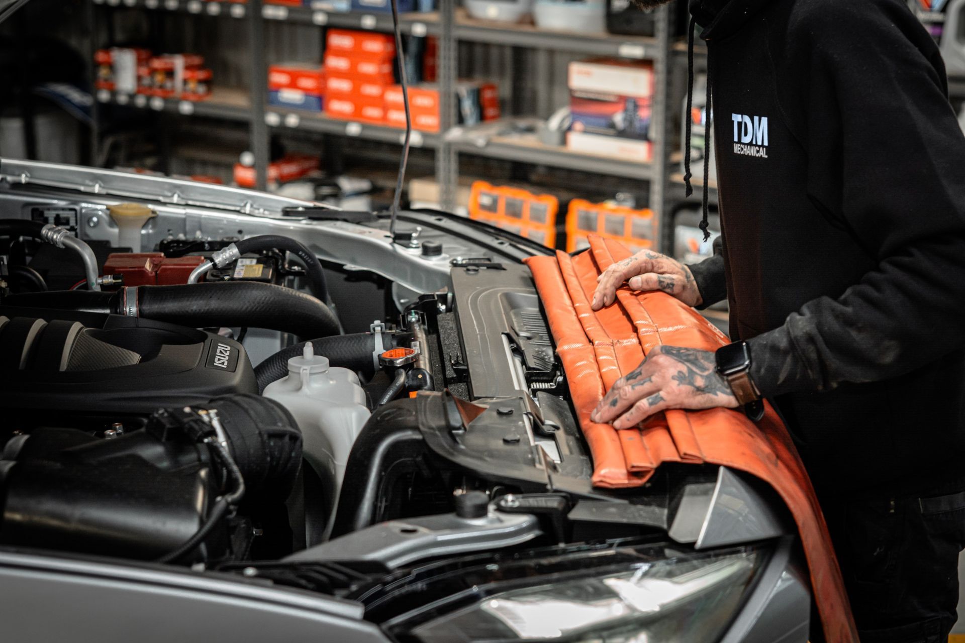 Mechanic inspecting a car