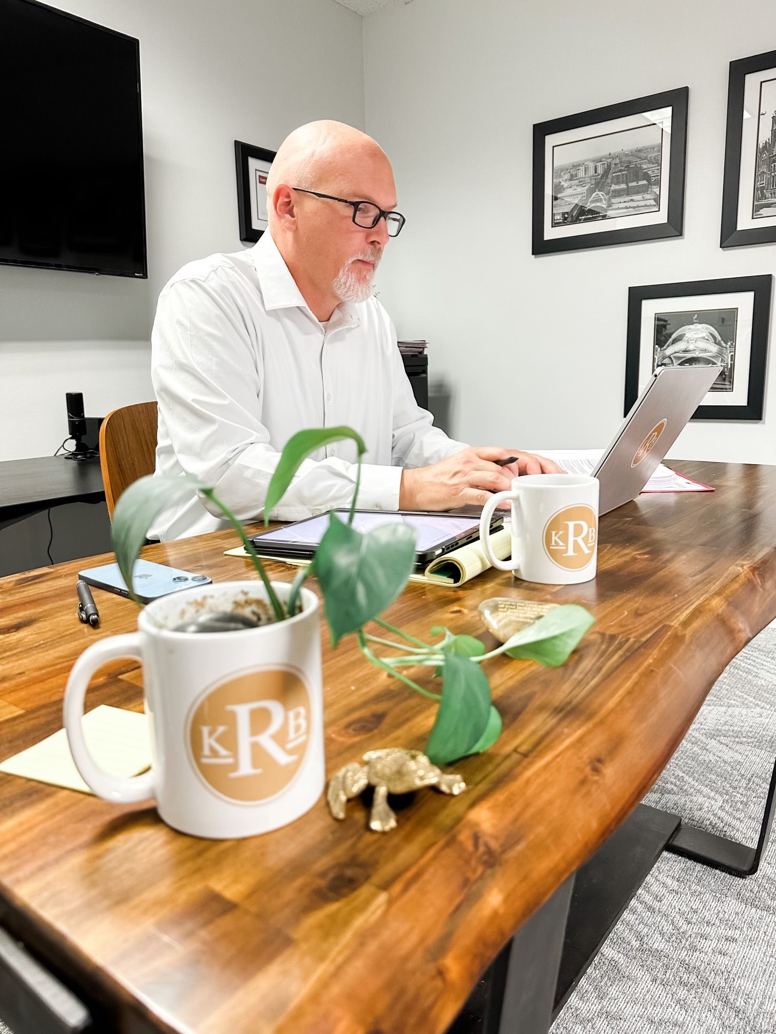 Attorney Ross working on a computer at his desk