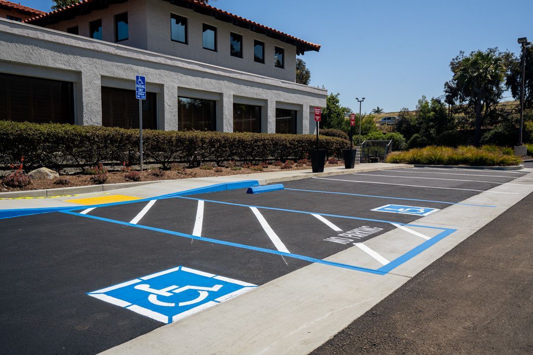 A handicapped parking spot in front of a building