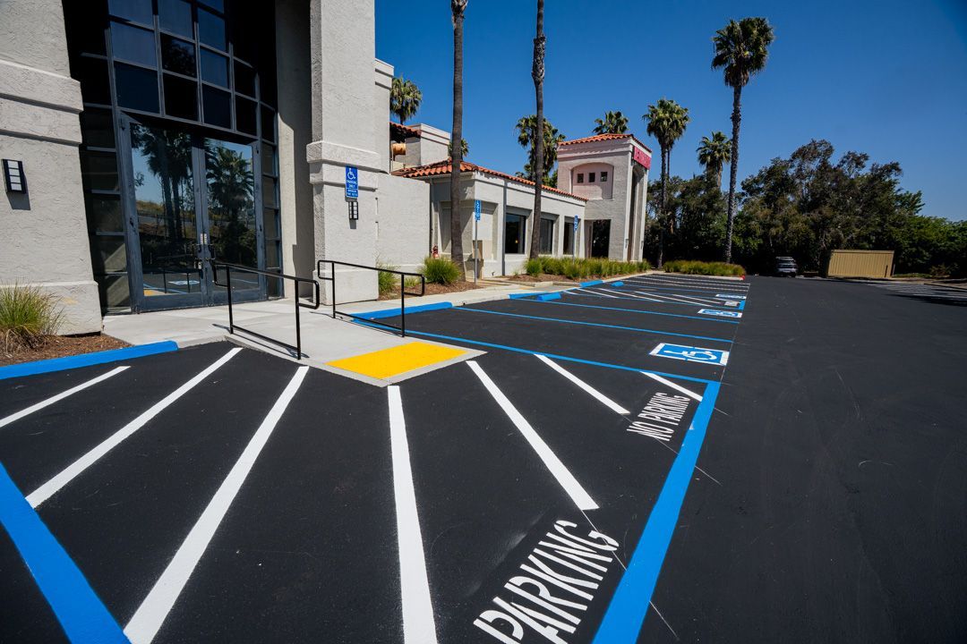 A handicapped parking spot in front of a building